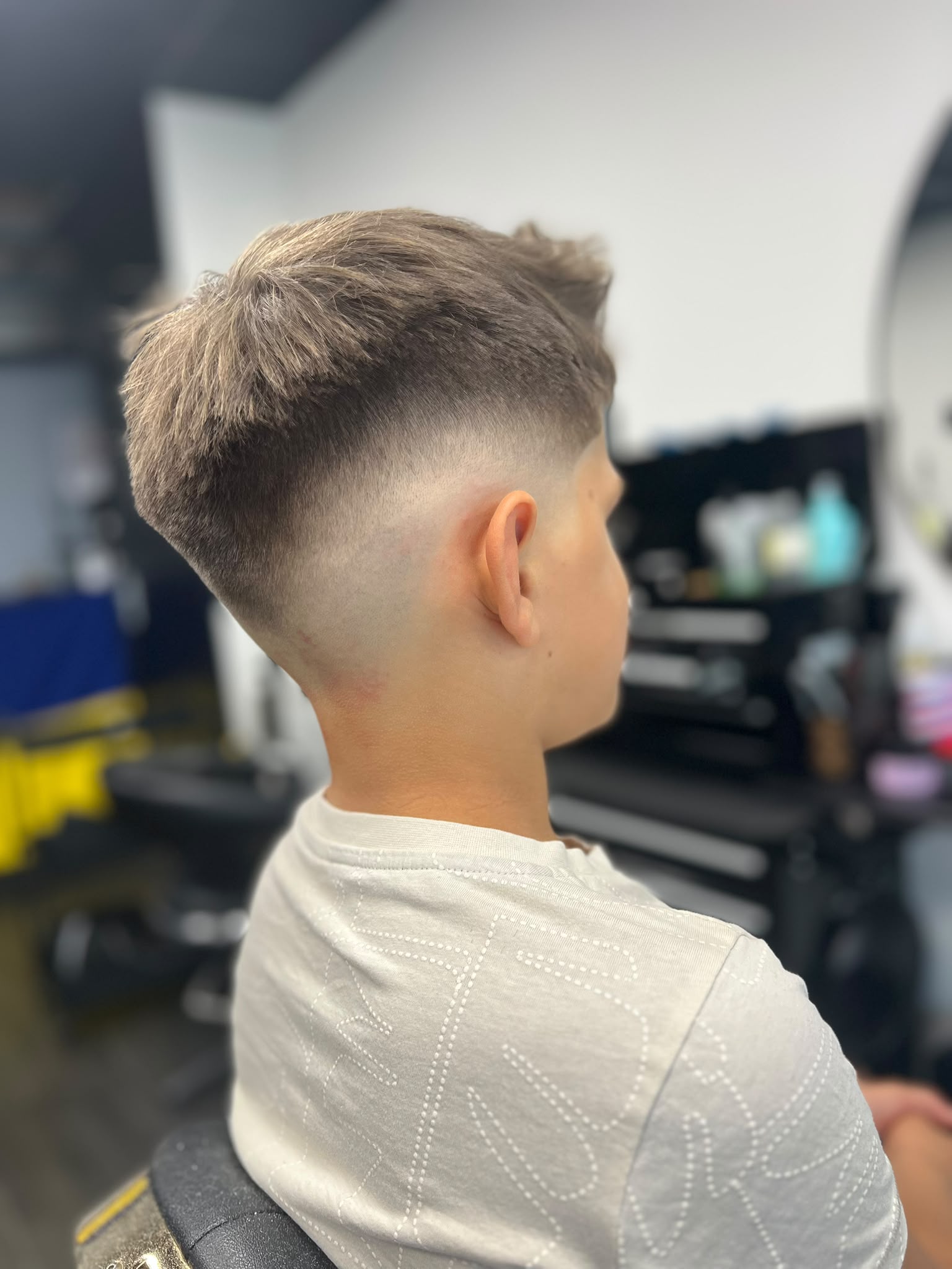 Kind knipbeurt met mid fade